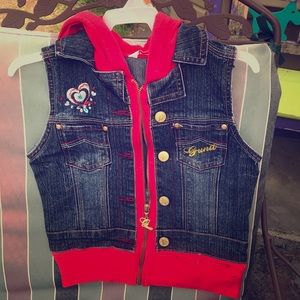 Little girls vest with red sweater